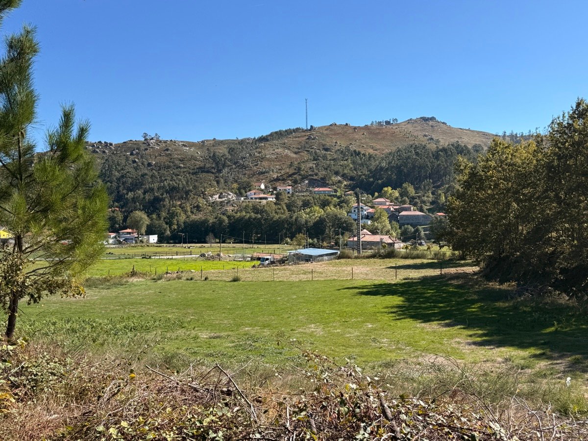 View of the property with a village on the mountainside